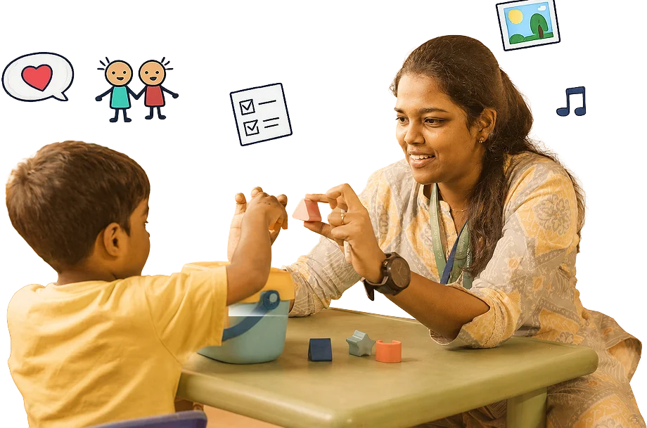 Child learning with therapist during early intervention support program